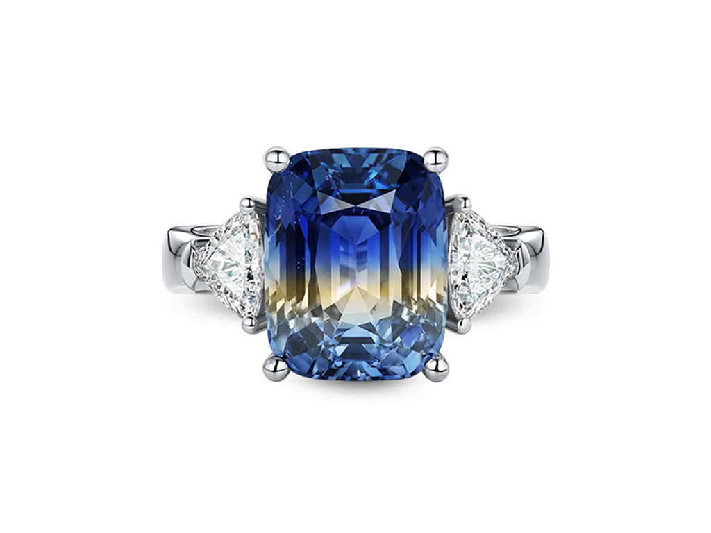A ring with a bi-color 8.04 carat Sri Lankan sapphire and diamonds in 18k white gold Image №1