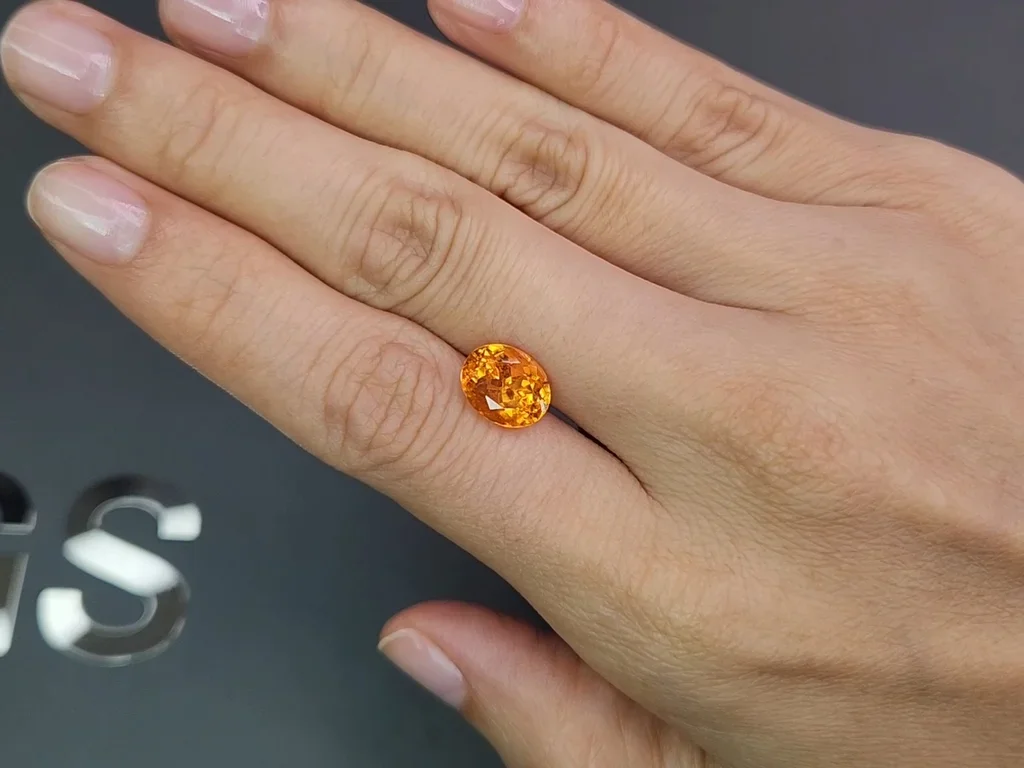 Vivid orange Fanta color spessartine garnet in oval cut 4.29 carats  Image №2