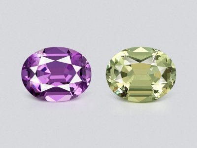 Contrasting pair of violet amethyst and prasiolite (green quartz) in a high-precision cut oval 17.23 carats, Africa photo