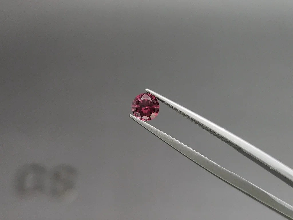 Rhodolite garnet round cut 0.55 carats, Madagascar Image №3