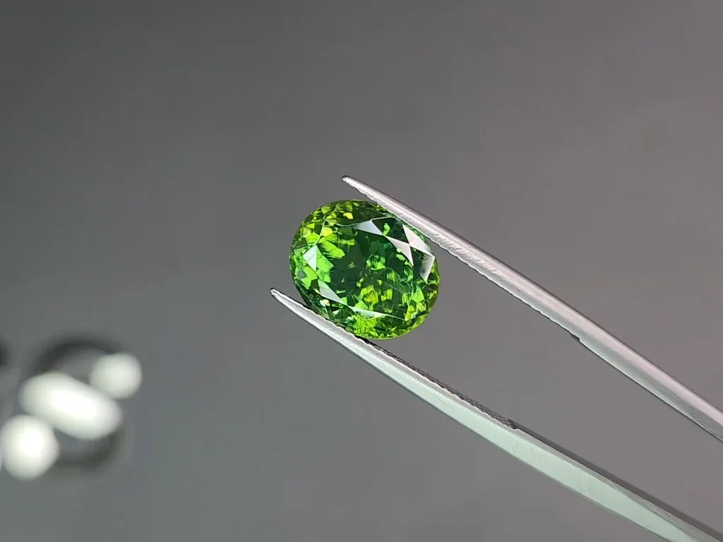 Intense green zircon in oval cut 6.40 carats Image №3