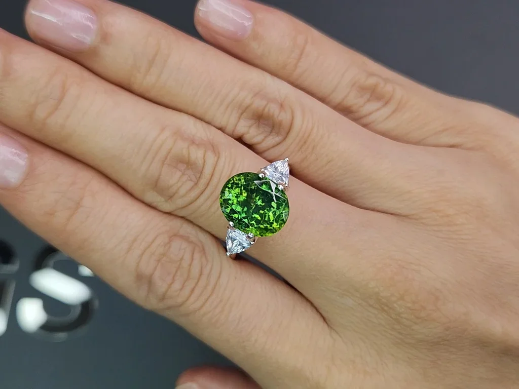 Intense green zircon in oval cut 6.40 carats Image №5