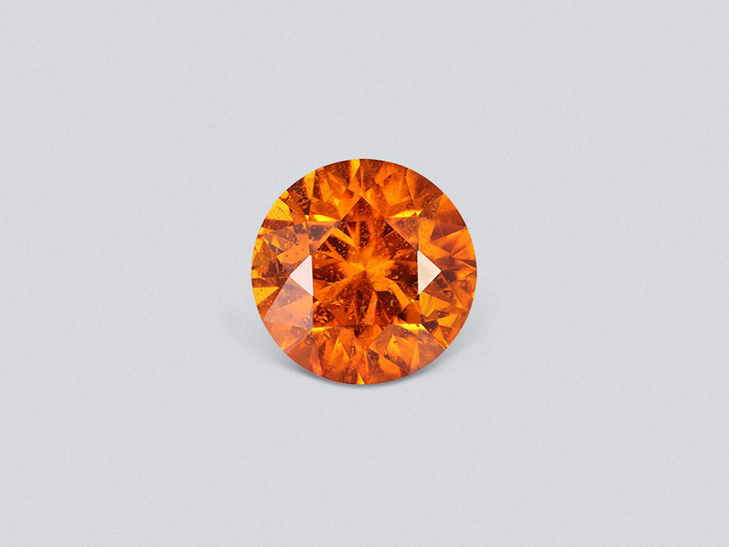 Vivid orange clinohumite 4.24 ct in round cut, Afghanistan Image №1