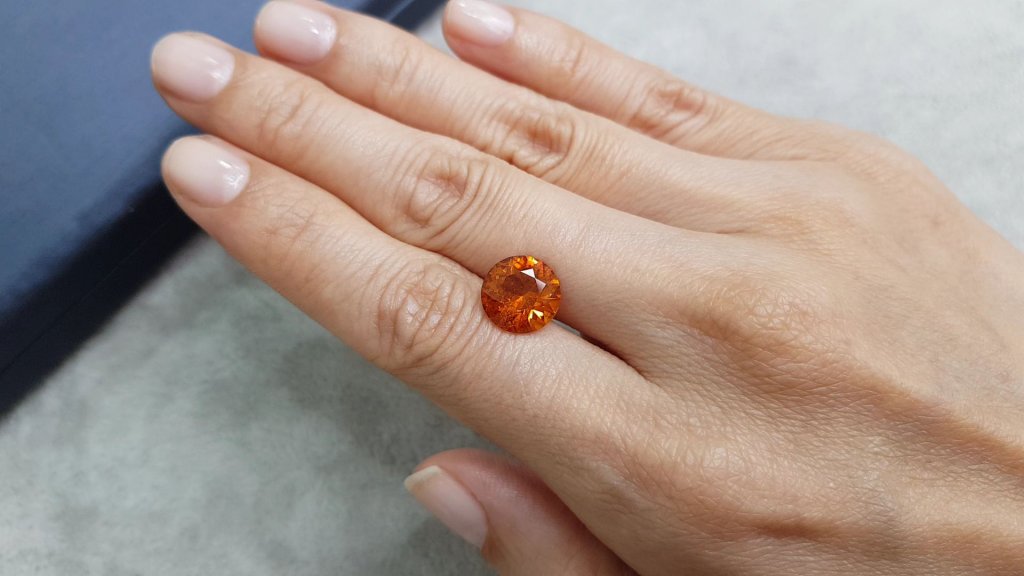 Vivid orange clinohumite 4.24 ct in round cut, Afghanistan Image №2