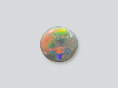 Harlequin opal in cabochon cut 4.23 carats, Australia photo