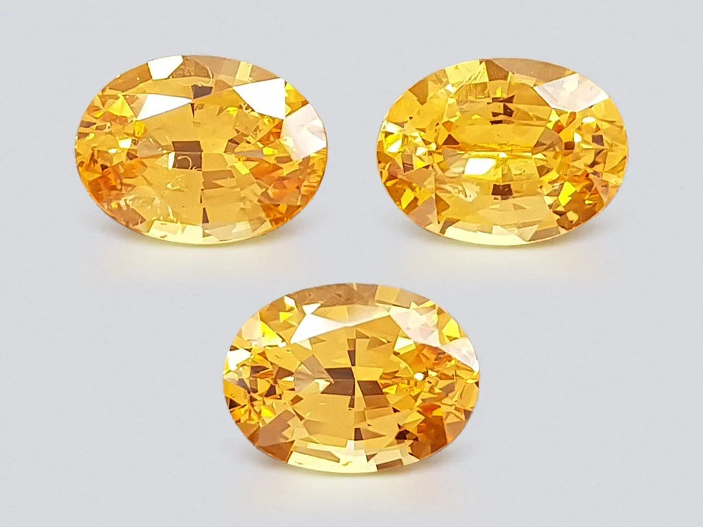 Set of three oval cut spessartines 4.68 carats Image №1
