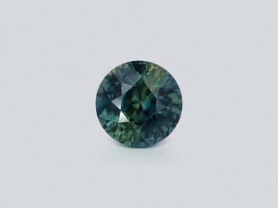 Unheated Bi-color sapphire in round cut 1.53 carats, Madagascar photo