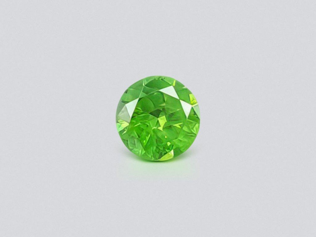 Russian demantoid with horse tail like inclusion 0.87 ct Image №1