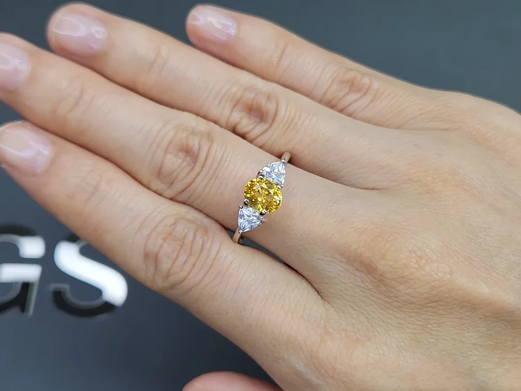 Golden color yellow sapphire in oval cut 1.52 carats, Sri Lanka  Image №5