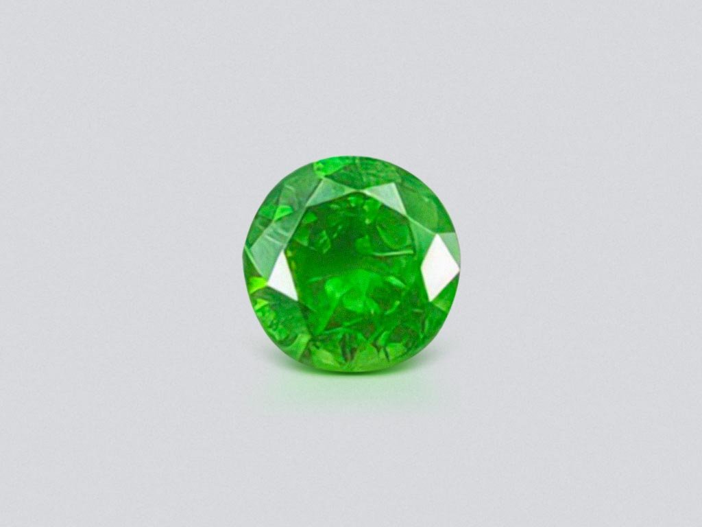 Russian demantoid with horse tail like inclision 0.58 ct Image №1