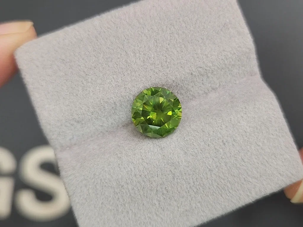 Large russian demantoid with horse tail like inclusion 3.35 ct Image №3