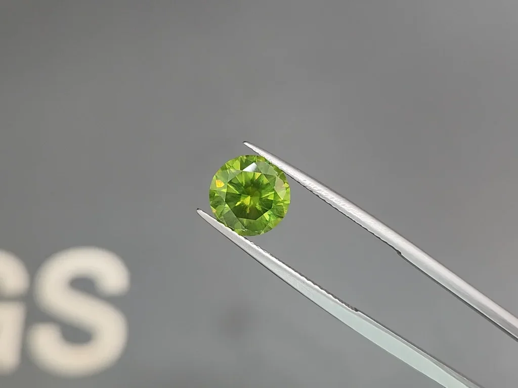 Large russian demantoid with horse tail like inclusion 3.35 ct Image №2