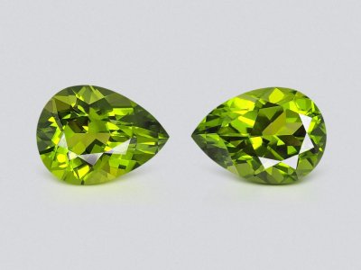 Pair of intense green peridots in pear cut 17.75 carats photo