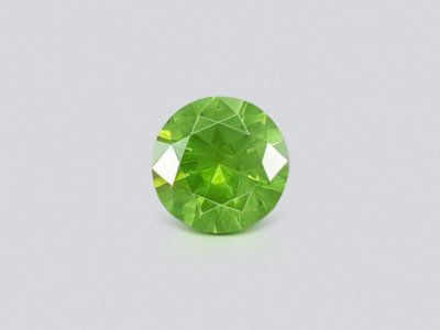 Demantoid with horse tail like inclusion 1.09 ct, Ural Mountains, Russia photo