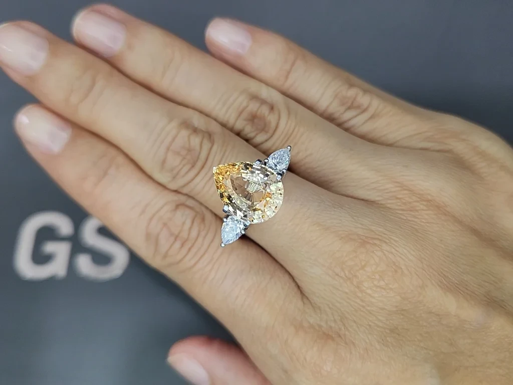Unheated orangy-yellow sapphire in pear cut 7.04 carats, Madagascar Image №5