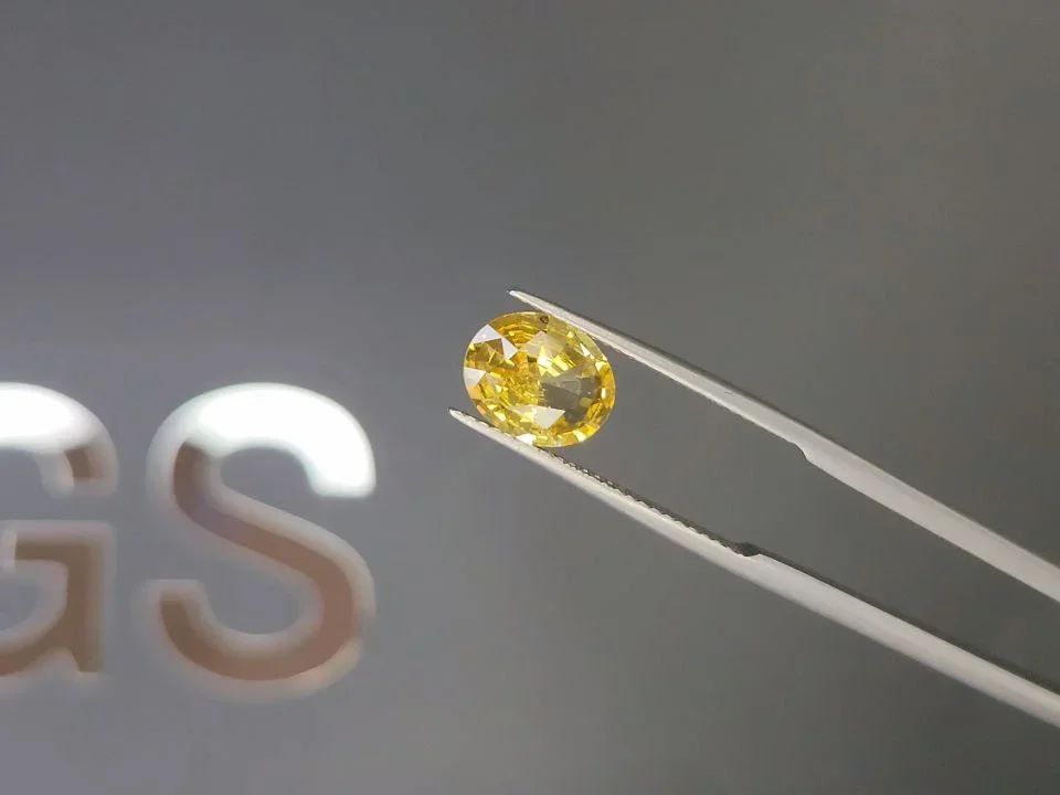 Vivid yellow sapphire in oval cut 2.16 carats, Sri Lanka  Image №3