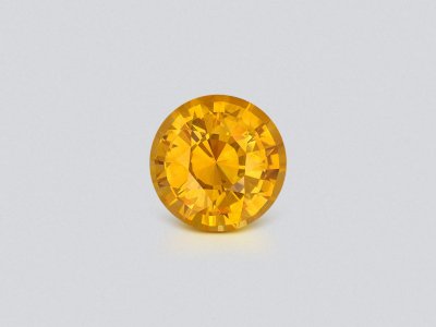 Golden yellow sapphire in round cut 4.04 carats, Sri Lanka photo