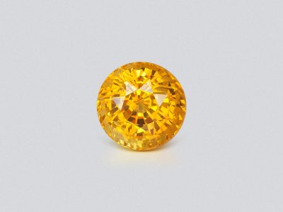 Golden yellow sapphire in round cut 5.82 carats, Sri Lanka photo