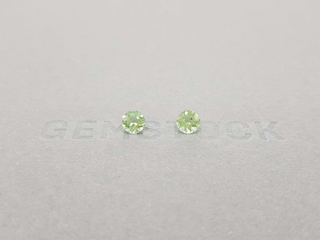 A pair of bright green tourmalines in a 5 mm round cut Image №4