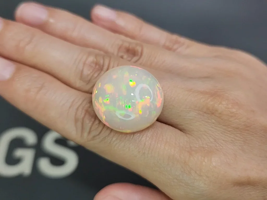 White opal round cut 27.34 carats, Ethiopia Image №2