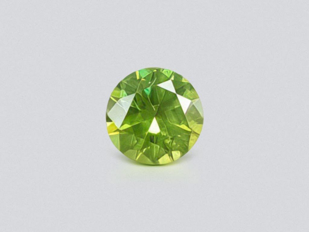 Russian demantoid in round cut 0.94 ct, Ural Image №1