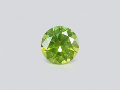 Russian demantoid in round cut 0.94 ct, Ural photo