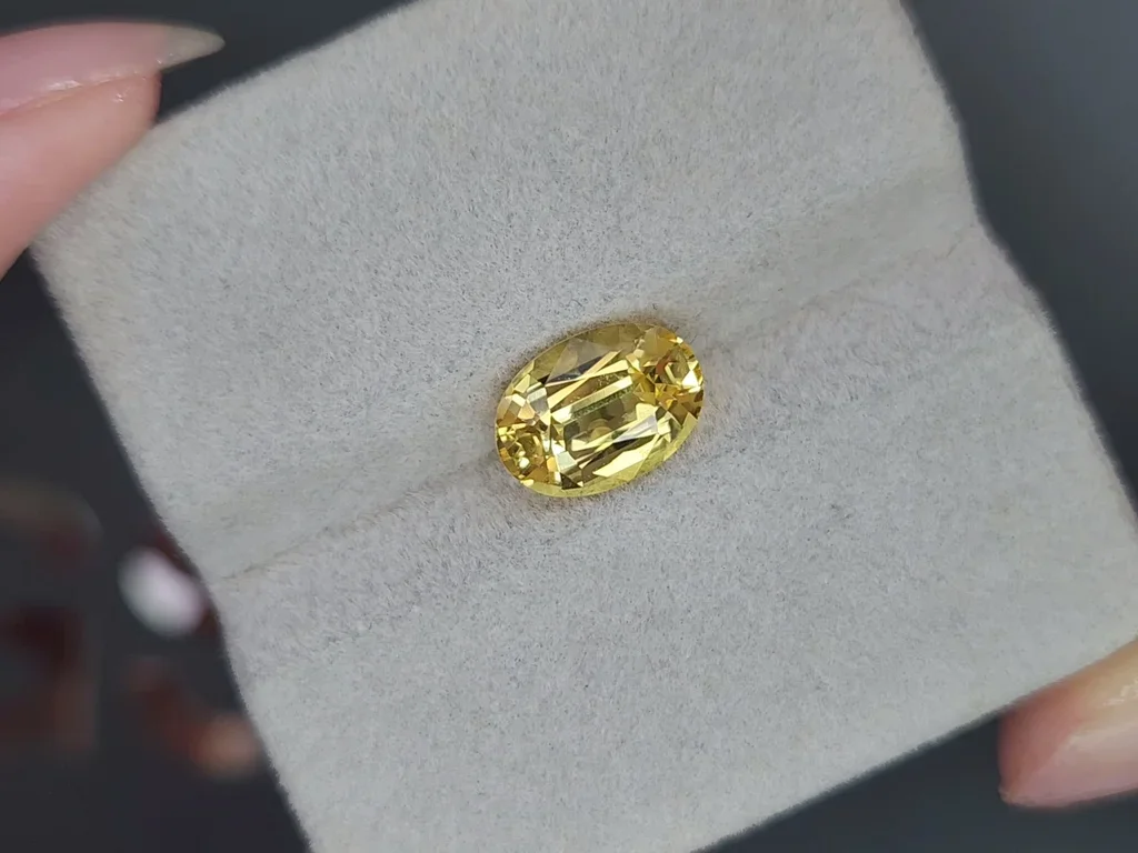 Unheated intense yellow sapphire in oval cut 3.14 carats, Sri Lanka  Image №4