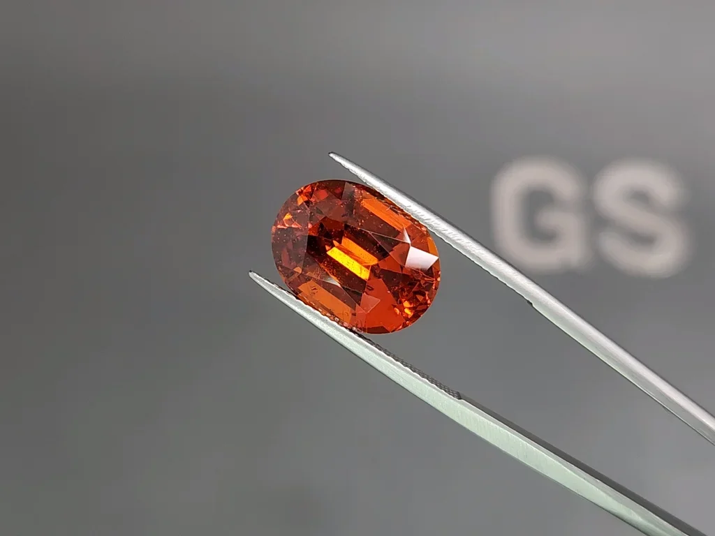 Vivid orange-red spessartine in oval cut 12.88 carats, Nigeria  Image №3