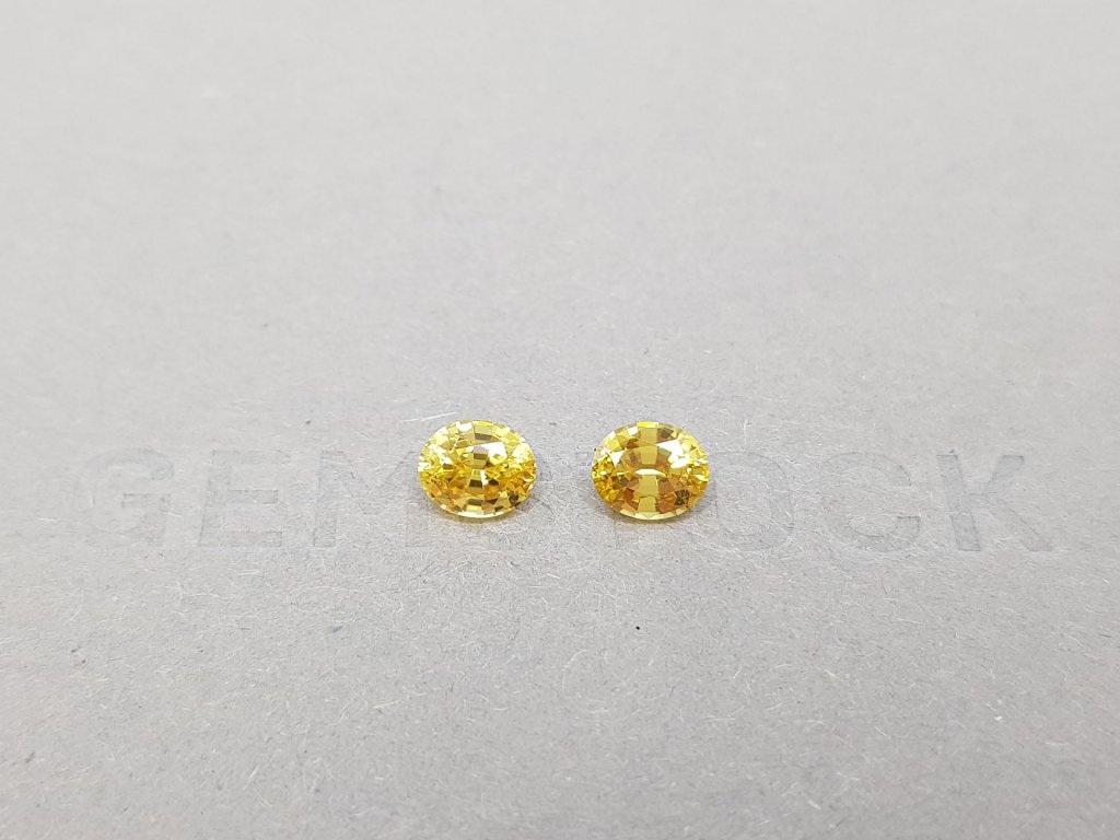Pair of orangey yellow oval cut zircons 2.00 ct, Madagascar Image №1
