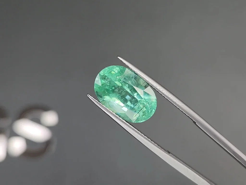 Neon greenish-blue Paraiba tourmaline in oval cut 6.88 carats, Mozambique Image №3