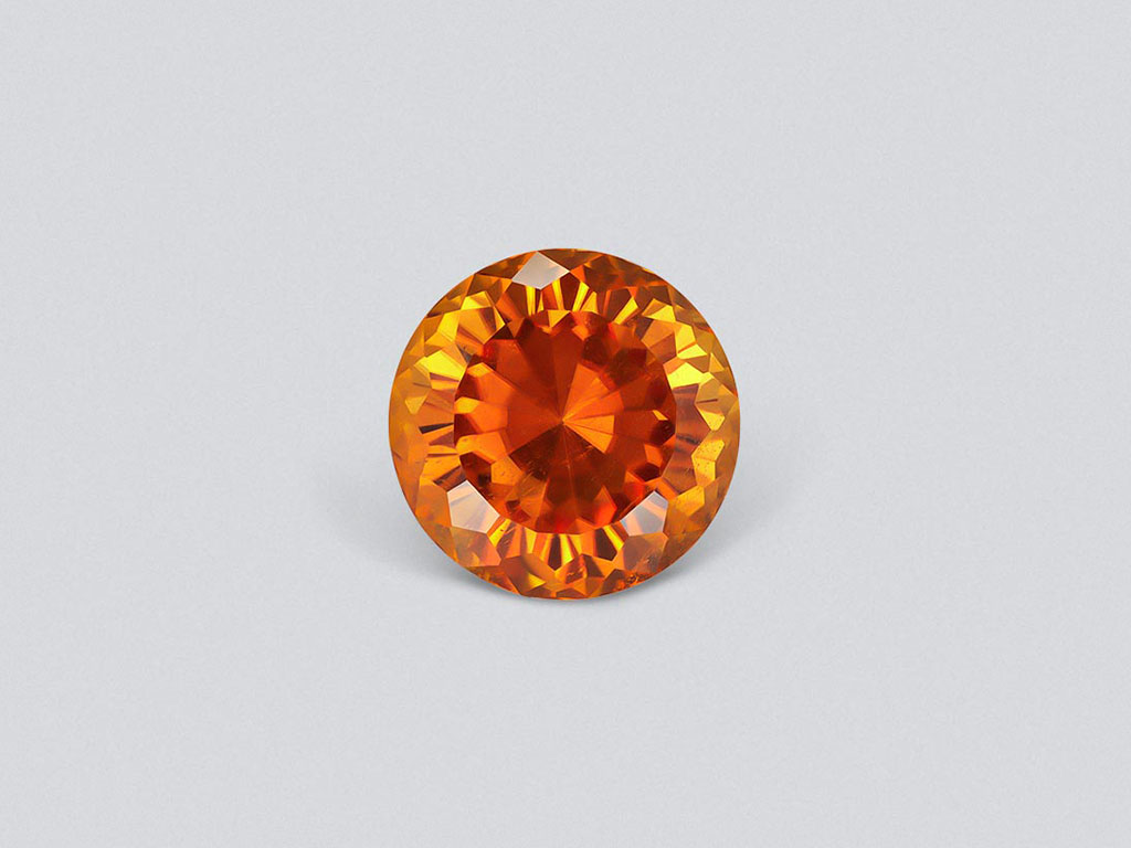 Vivid orange clinohumite 3.88 carats in round cut, Afghanistan Image №1