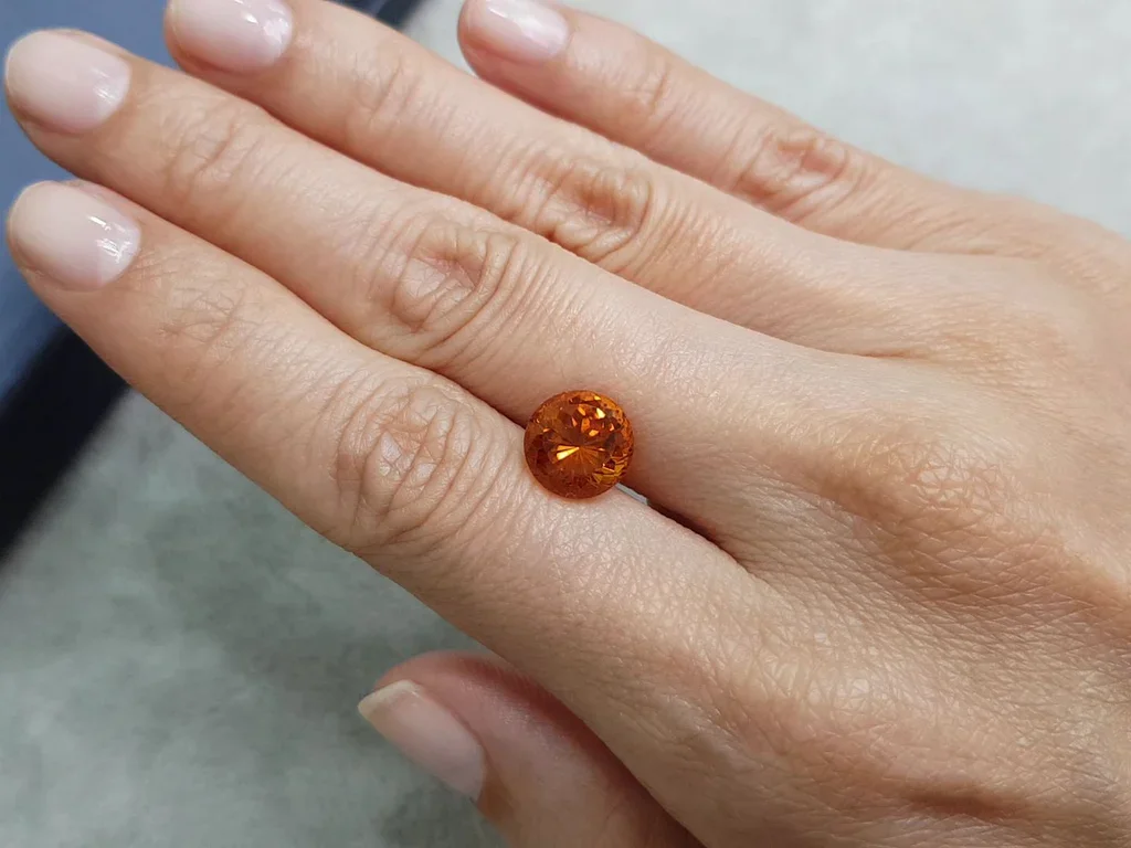 Vivid orange clinohumite 3.88 carats in round cut, Afghanistan Image №2
