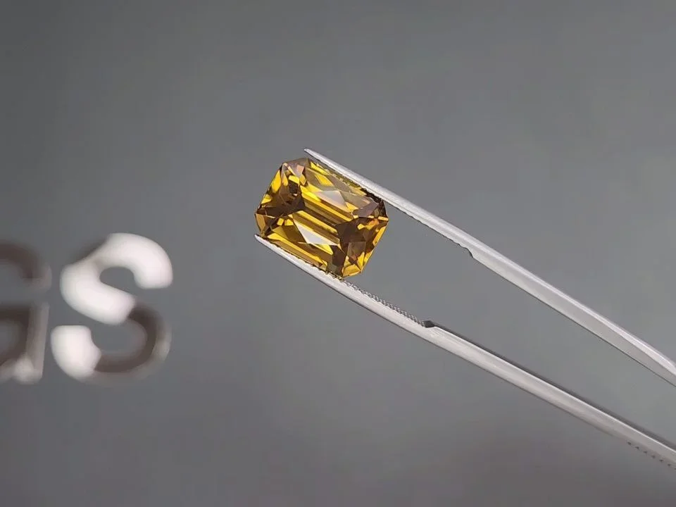 Yellow-brown zircon in radiant cut 11.42 carats, Tanzania  Image №3