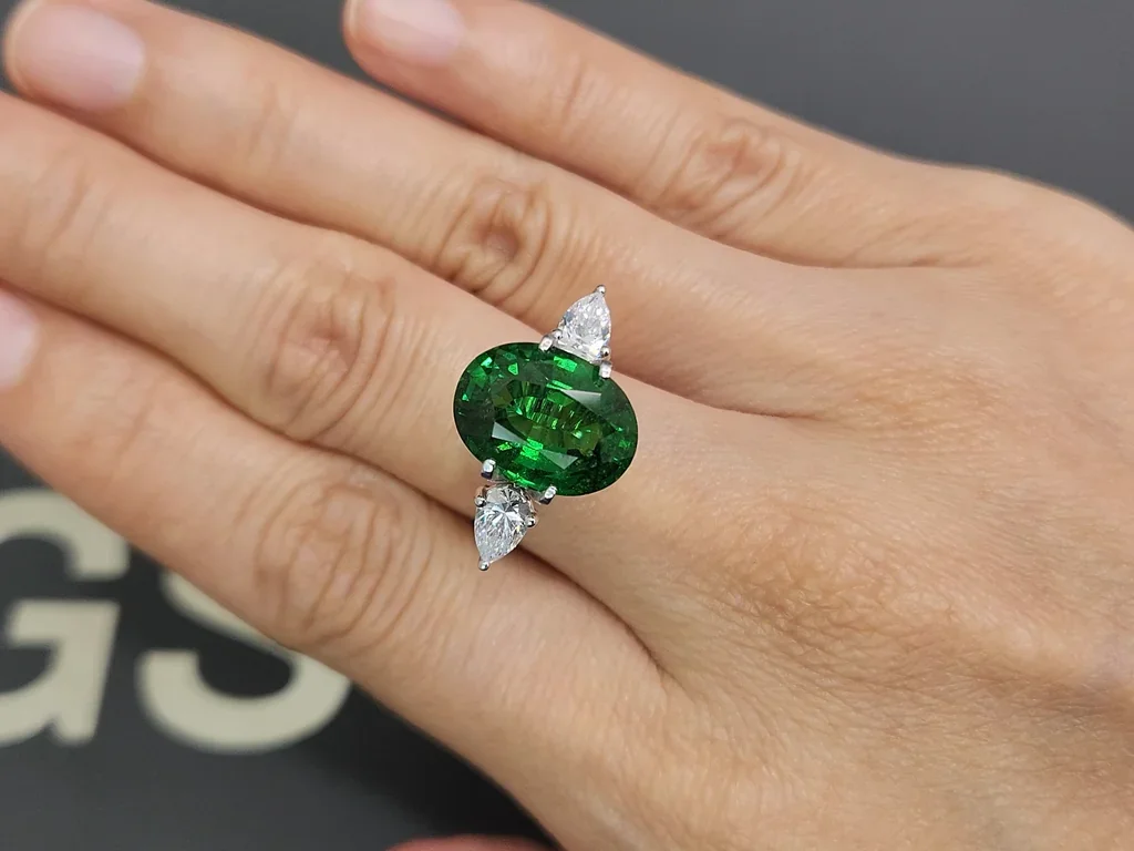 Vivid Green tsavorite garnet in oval cut 7.04 carats, Tanzania  Image №5