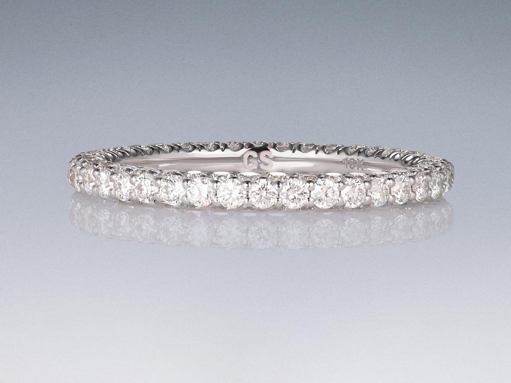 Ring with diamonds in 18K white gold Image №1