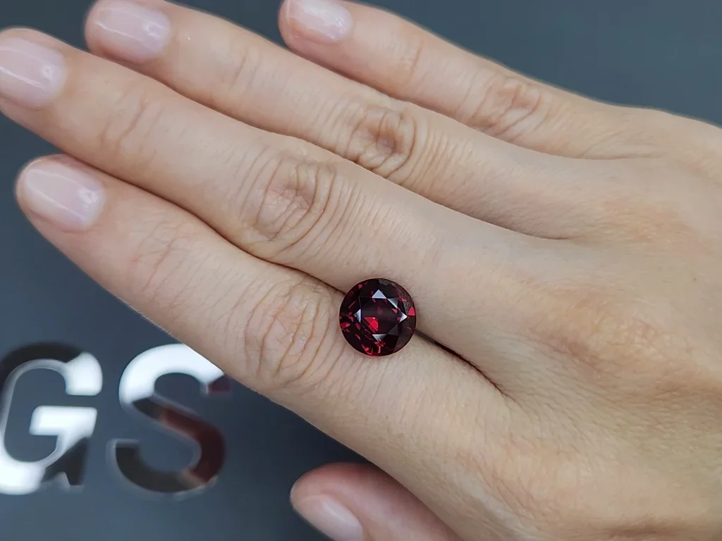Red-orange rhodolite garnet in round cut 5.09 carats, Tanzania Image №2