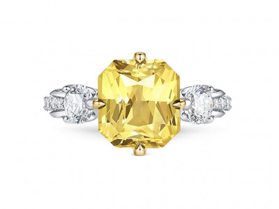 A ring with a 5.02 carat yellow sapphire from Sri Lanka and diamonds in 18K white and yellow gold. photo