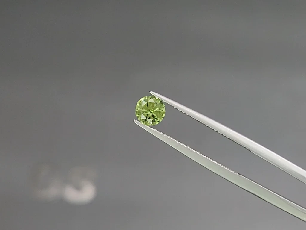 Garnet tsavorite round cut 0.61 carats, Madagascar Image №3
