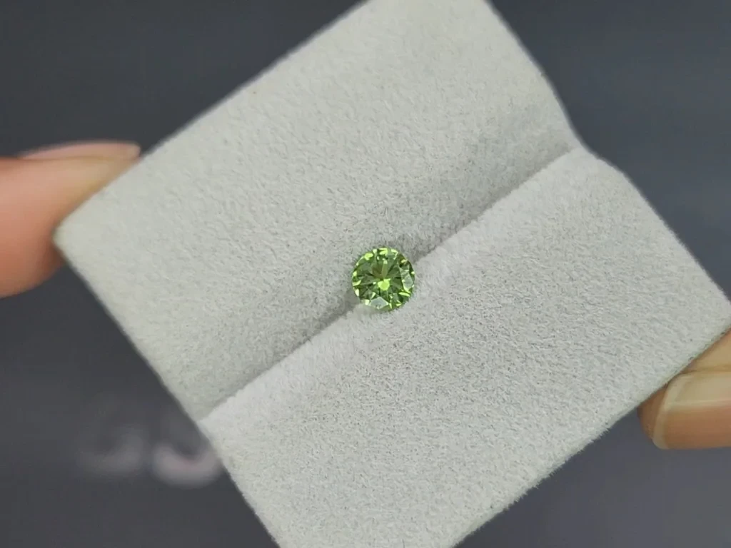 Garnet tsavorite round cut 0.61 carats, Madagascar Image №4