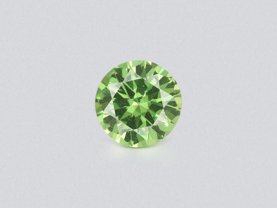 Garnet tsavorite round cut 0.61 carats, Madagascar photo