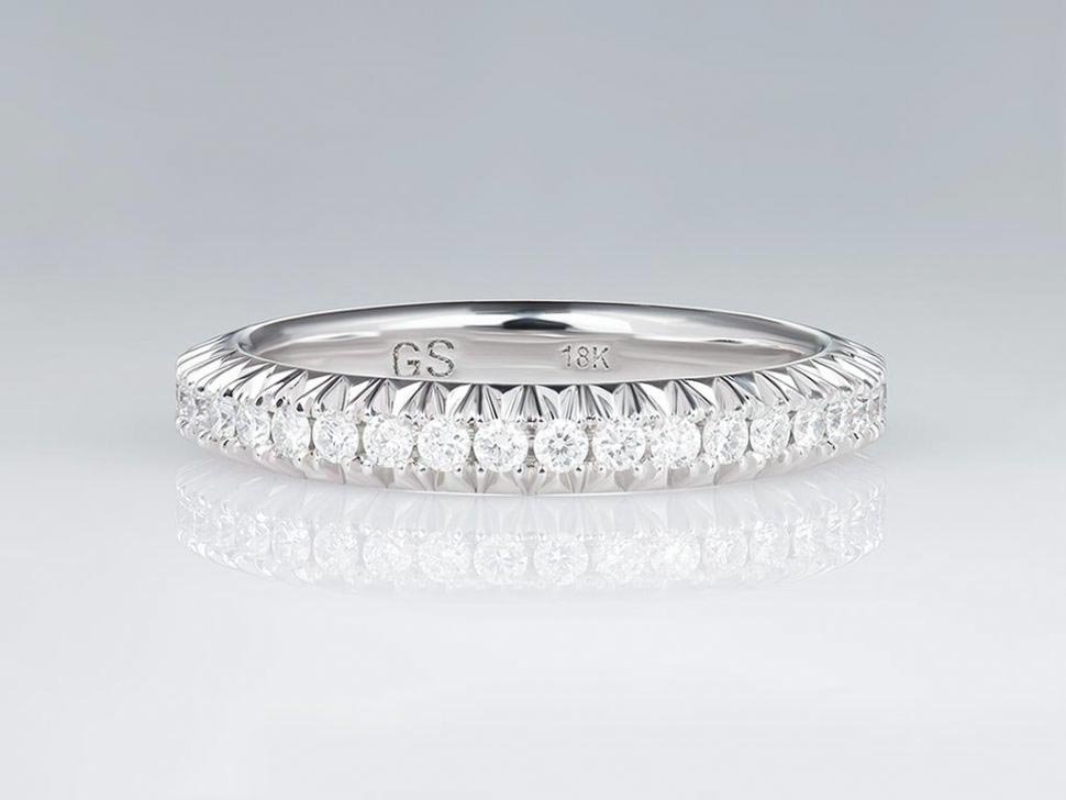 Ring with diamonds in 18K white gold Image №1